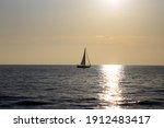 Sailboat On The Horizon Backlit ...