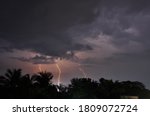 Small photo of A fiercest, blackest, booming thunderstorm while raining