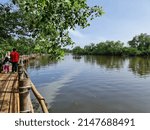 Small photo of Kelantan, Malaysia - October 23, 2020 : Kampung Pulau Tengah is a village located in Kubang Kerian, Kelantan. Popular and got the attention of visitors with the ‘Floating Bridge’ along the river