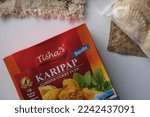 Small photo of Kelantan, Malaysia - November 18, 2022 : One of Tisha's frozen products is Sardine Curry Puff (in malay Karipap Sardin). Made from flour and beef filling inside.