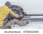 Man take tire with snow chain