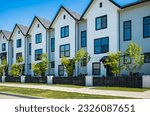 Small photo of New Modern Apartment Buildings in Vancouver BC. Canadian modern residential architecture on sunny summer day. Nobody, street photo-Vancouver BC. Real estate development, house for sale, housing market