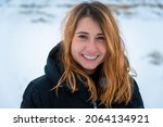 Small photo of portrait of Natalia in a snow day, Bardenas, the desert of Spain