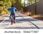 Australian boy riding his bicycle on bike lane on a day, South Australia