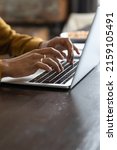 Small photo of Close up cropped vertical view African female hands typing on laptop keyboard, student prepare task, studying on-line. Correspondence to client use e-mail, workflow use modern tech, freelance concept