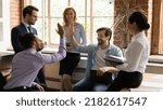 Small photo of African and Caucasian workmates diverse buddies friends giving high five gesture making agreement during group briefing in office. Make a bet or wager, partnership, support, racial equality concept