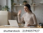 Small photo of Young woman in headphones start online class, greets tutor feels happy enjoy effective e-learn, use video call and laptop. Video conference for study, easy, comfort modern tech usage. Tuition