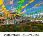 Small photo of Historic town bandstand decorated with colorful paper pennants.