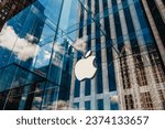 Small photo of New York, NY, USA - September 25, 2023: Modern stylish logo and glass entrance Apple Store building on Fifth Avenue in New York City, USA.