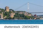 Small photo of Istanbul, Turkey, 23.07.2017: Bogazici'ndeki Bogazici Kitalararasi Yuzme Yarismasi yuzuculerinin goruntuleri ve arka planda rumeli hisari ile kopru