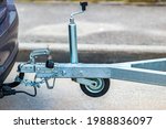 Trailer coupling device for towing a trailer by a passenger car. Cargo transportation and delivery business. Sale, rental and maintenance of trailers. Trailer driving safety concept. 