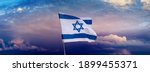 Israeli flag with a star of...