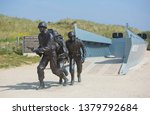 Small photo of Normandy, France - June 2019: 75th Anniversary of the D-Day landings. Memorial to the Andrew Jackson Higgins and the Higgins landing craft, near Utah Beach, Normandy.