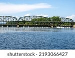 Small photo of Rotterdam, NY aE“ USA - Aug 5, 2022 Horizontal View of The Movable Dam at Lock 8, a three-span moveable dam with a walkway across the Mohawk River