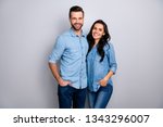 Close up photo funky beautiful amazing cheer she her he him his couple lady guy friends stand close hands arms pockets wear casual jeans denim shirts outfit clothes isolated light grey background