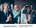 Small photo of Portrait of nice cheerful beautiful handsome elegant classy stylish trendy top executive managers attending classes clapping palms congrats at industrial loft style interior room work place station