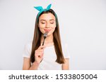 Portrait of inspired dreamy girl hold fork feel hungry want eat imagine tasty meal delicious burger close eyes wear stylish blue headband t-shirt isolated over white color background