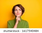 Closeup photo of amazing short hairdo lady looking up empty space deep thinking creative person arm on chin wear casual green turtleneck isolated yellow color background