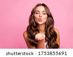 Just for you. Photo of pretty attractive curly lady send air kisses open palm flirting boyfriend tempting lips wear white casual singlet isolated bright pink color background
