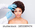 Small photo of Close-up portrait of her she nice attractive peaceful perfect wavy-haired girl doctor's hand doing prick natural organic filler anti wrinkles detox isolated on light white gray color pastel background