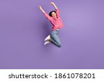 Full length body size photo of jumping high female student gesturing like winner overjoyed isolated on bright purple color background