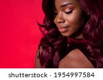 Cropped photo of attractive dark skin young woman empty space dream mood isolated on red color background