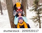 Photo of lovely family happy positive smile enjoy time together weekend walk snowy park winter frost