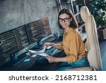 Small photo of Profile side view portrait of attractive cheerful smart clever girl geek developing web company research at workplace workstation indoors