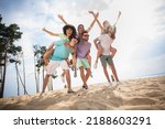 Small photo of Full size photo of group overjoyed carefree people piggyback rejoice walk sand beach free time outside