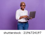 Small photo of Photo of pretty sweet short hair lady wear smart casual look eyewear typing modern device isolated purple color background