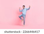 Full body cadre of young positive energetic dancer student guy wear new apple airpods pro best music sound quality isolated on pink color background