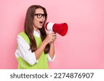 Photo of angry boss young company business woman wear green vest scream noise microphone look mockup bad news isolated on pink color background