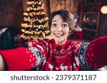 Selfie photo of funky young girl tongue stick out joking childish playing rejoice tradition atmosphere christmas vibe isolated indoors