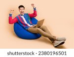 Full body length size photo of crazy stocks market trader young guy celebrate his deal successfully done isolated on beige color background