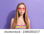 Photo portrait of cute teen blonde woman pouted lips heart glasses dressed stylish striped clothes isolated on violet color background