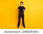 Small photo of Full size photo of serious cool confident authoritative policewoman in black uniform isolated on yellow color background