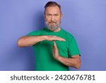 Small photo of Photo of focused calm person arms demonstrate stop timeout symbol isolated on violet color background