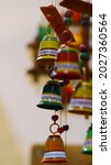 Small photo of Indian style ornamental pot and bells room desecration