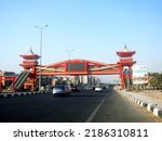 Small photo of Cairo, Egypt, July 31 2022: Shinzo Abe axis patrol highway in Egypt with a pedestrian bridge finished in traditional Japanese architectural style, the traffic highway is named on former Japanese PM