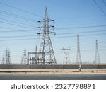 Small photo of A transmission tower, electricity pylon which is a tall steel lattice structure that used to support overhead high voltage power lines, high voltage electric pillar and sky background in Egypt