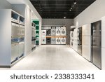 Small photo of Interior of premium home appliance store in a mall