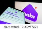 Small photo of Stuttgart, Germany - 05-20-2022: Mobile phone with website of Colombian company INVERSIONES MCN SAS (Habi) on screen in front of business logo. Focus on top-left of phone display. Unmodified photo.