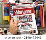 Small photo of Paris, France - Apr 11, 2022: Stand with Marianne newspaper magazine covering the French presidential election of 2022, Macron, Melenchon, Le pen, Zemmour, Hidalgo, Pecresse, Jadot, Putou, Roussel