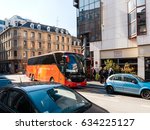 Small photo of STRASBOURG, FRANCE - APR 27, 2017: German tourists descending red Setra unser rotter bus for Mercure Hotel in central Strasbourg on a sunny spring day