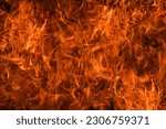 Small photo of Fire blaze flames on black background. Fire burn flame isolated, abstract texture. Flaming explosion with burning effect. Fire wallpaper, abstract fire pattern.