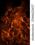 Small photo of Fire blaze flames on black background. Fire burn flame isolated, abstract texture. Flaming explosion with burning effect. Fire wallpaper, abstract art pattern.