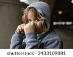 Small photo of Aggressive child fight. Little kid boy fighting outside. Angry little boy showing fist. Portrait of fight kid. Bullied, physical abuse, children fighting. Aggression little boy. Kids bad behavioral.