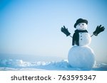 Snowman gentleman in winter black hat, scarf and gloves. New year snowman spy agent. Christmas and winter fashion. Happy holiday celebration. Xmas or christmas party, copy space