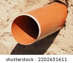 Plastic sewer pipe in the ground. Installation of water main, sanitary sewer, storm drain systems
