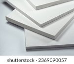 Small photo of PVC white plastic sheets. Light and durable foam board. Rigid and lightweight polyvinyl chloride